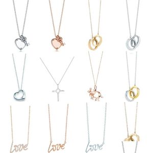 Ожерелья с подвесками Очаровательный подарок 100% 925 Sier Love And Key Cross Ожерелье с подвеской из розового золота и белых ювелирных изделий Match World Fit Jewelry3917441 Dhcrr