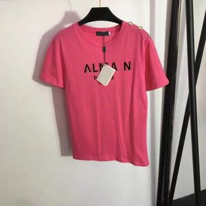 23 Designers T-shirts Women Tees Apparel New Shoulder Button Hot Gold Letter Print Kort ärm T-shirt Vit Rose Red Black Topps Officiell Samma stil Blusar Toppar SML