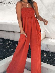 Sexiga hängslen Löst Jumpsuit Kvinnor veckade fickan Boho Beach Holiday Wide Leg Trousers Spring Summer Casual Solid Rompe