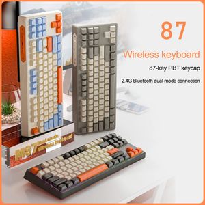 Клавиатуры 87 клавиш 24G WirelessBluetooth 50 Двухрежимное подключение Игровая офисная клавиатура с шариковой крышкой из ПБТ Радужная разноцветная подсветка 231123