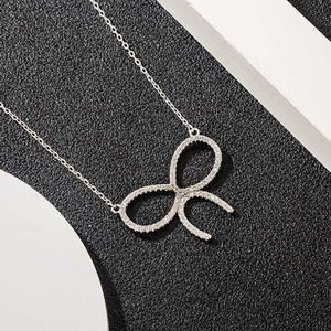 Tiffanylise Nuova collana coreana della famiglia T femminile S925 in argento sterling con ghiaccio con pendente pieno di diamanti alla moda Catena clavicola 9k9b