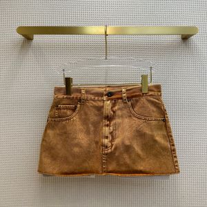 Skirts European fashion brand Earth tone antique bronze yellow worn denim series short motorcycle denim skirt