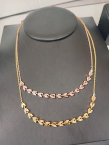 リーフシルバー18Kゴールドダイヤモンドクロスペンダント女性のための初期ネックレス