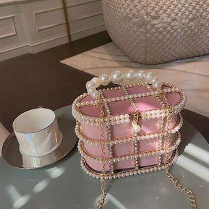 Borse da sera Borsa con pochette con cesto di diamanti 2023 Borsa con gabbia metallica in rilievo di perle scavate di lusso Borsa da donna per la festa nuziale 231123