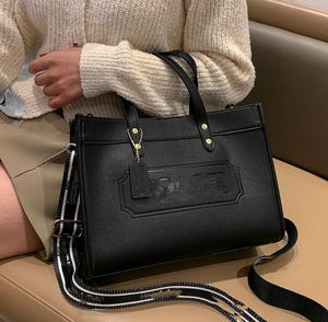 Fashion Autumn Women Bag Pu Women's Bag präglad Logo Crossbody Bag Female Shoulder Bags Stora kapacitet Totes