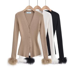 Prrra의 최신 오리지널 디자인 여성용 버튼 니트 고품질 오리지널 여자 니트 재킷 세련된 캐주얼 흑백 카키색 까마귀 까마귀.