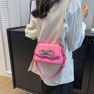 مصمم عصري صغير رينستون القوس حقائب اليد والمحافظ على النساء الكتف Crossbody 2023 أكياس رسول جديدة جودة عالية الجودة