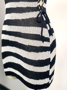 新しいデザイナーニットドレス夏の女性タートルネックボディボディーコンドレスノースリーブストライプニット編み包帯ミニサンドレスバルク卸売服9756