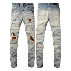 Calças jeans de grife amiiri 2023 nova tendência moda ajuste fino pé pequeno remendo elástico jeans masculino amiiri marca de moda desgastado rasgado skinny para venda