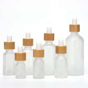 Frostat glas dropper eteriska oljeflaskor bambu trä cap 5 ml 10 ml 15 ml 30 ml 50 ml bärbar doft parfym resor tom kosmetisk aromaterapi förpackningsflaskor