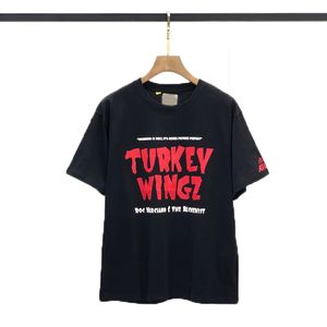 Trendiga gata mode mäns runda nackbrev tryckt t-shirt lös casual semester svart ren bomull kortärmad toppar polo skjorta män