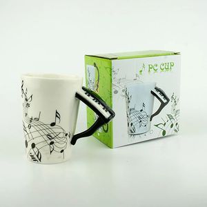 Mugs Novelty 220ml Piano Ceramic Cup Music Note Milk Juice Lemon Mug Coffee Tea Cup Christmas Year Gift 231124