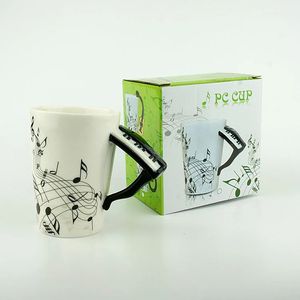 Canecas Novidade 220ml Piano Cerâmica Copo Música Nota Suco de Leite Limão Caneca Café Xícara de Chá Presente de Ano de Natal 231124