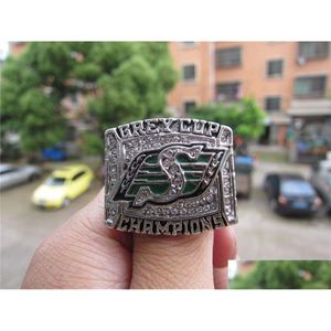 Кольца кластера 2007 Saskatchewan Roughriders Кольцо чемпионата Grey Cup с деревянной коробкой Мужской сувенирный подарок для фанатов Оптовая продажа Drop Drop D Dhxgs