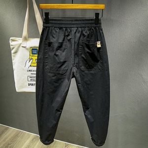 Calça masculina linho de algodão calças de harém homens homens elásticos de rua elástica sólidos calças de rua folgadas calças groches casuais homens 230425