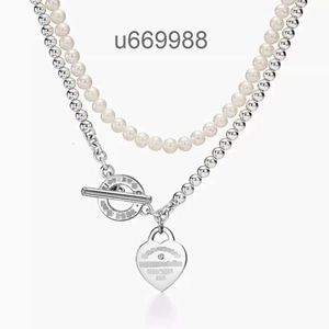 Högkvalitativ t Populärt temperament 925 Sterling Silver OT Buckle Layer Pearl Heart Shaped Pendant With Diamond Necklace For Women