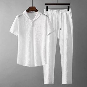 Мужские легкие костюмы 2PCSSET Летние наряды Наборы наборы чистого цвета Рубашки с коротким рукавом.