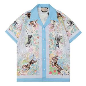 Mens Designer Shirts Short Sleeved T Shirt Letter Lapel Button Strawberry Printing Sport Leisure Flower Animal Tshirts Luxury Men Tshirt Seaside Holiday Coat