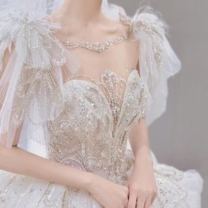 Elegante wulstige A-Linie Brautkleider Meerjungfrau Brautkleider mit abnehmbarem Zug Spitze Kristalle Applikationen Elfenbein Satin Brautkleid Strand Vestidos De Novia 2023