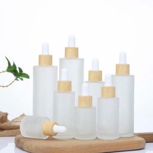 Frosted Glass Dropper Bottle Bottle Perfume Perfume Sposobowe butelki Pakowanie z imitowaną drewnianą pokrywką 20 ml 30 ml 50 ml 60 ml 100m Iaod