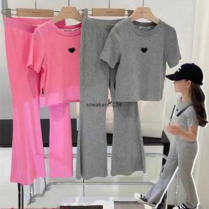 Uppsättningar Setelan Baju Bayi Perempuan Musim Panas Korea Atasan Lengan Pendek Solid Celana Menyala Dua Potong Pakaian Kaus Katun Kaki Lebar 230510