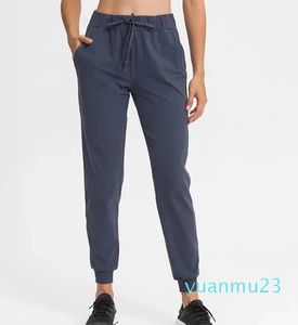 Klasik Joggers Drawcord Kolay Fit Yoga Pantolon Fitness Dans için Cep Ter Sesli Sweatpants Pist Pantolon Pantolon Nefes Alabilir Yumuşak Kadın Pantolon