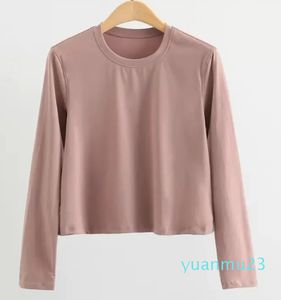 Con logo Yoga abbigliamento da donna a maniche lunghe sciolto nudo traspirante top sportivo abbigliamento fitness ad asciugatura rapida t-shirt da corsa camicetta autunno