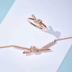 Designer Brand Knot necklace for women light luxury and niche rose gold bow ring collarbone chain pure silver set smiling trend
