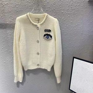 Projektantka damska okrągła szyja kolor drukowany skręt skrętu kreskówka Jacquard Knitted Sweat