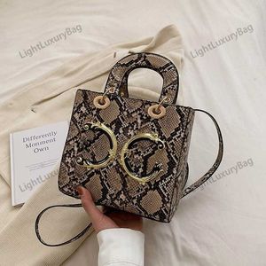 Ny designer snakeskin d mini handväska kvinnor märke olika färger mode crossbody väska g olika färger handväska lyxväska 230427