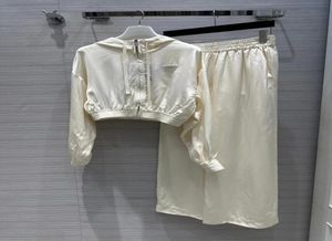 Pantaloni da donna a due pezzi 2023 Nuova primavera estate con cappuccio a maniche lunghe e marchio stesso stile Cappotto da 2 pezzi 0226241374278