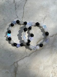 Bracciale abbinato fatto a mano con stella bianca e nera per amicizia/coppia