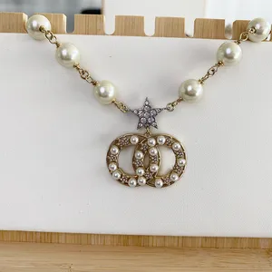 Stern-Doppelbuchstaben-Anhänger Perlenkette Designer für Frauen verblassen nie Diamant 18 Karat vergoldete Pulloverkette Hochzeitsgeschenk Jewerlry Accessoires