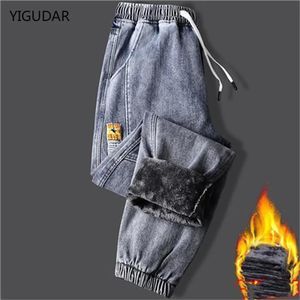 Calças de brim das mulheres calças de brim dos homens inverno velo grosso quente denim calças homens streetwear preto corredores harem jean calças térmicas 231127