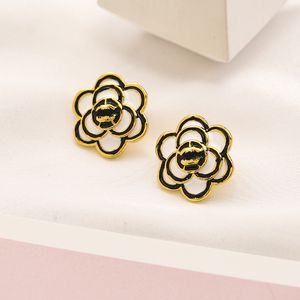Gestüt Geschenke Charme Gold plattiert schwarze Blumenohrringe für Frauen Designer 2023 Hochzeitsliebe Edelstahlschmuck