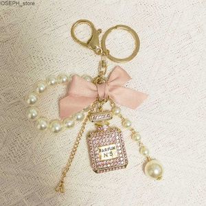 Key Rings Pearl Chain Number 5 Bottle Keychain For Woman Luxury Jewelry Bow Car Keyring Camellia Pearl Pendant Keychains Bag Decoration J230427