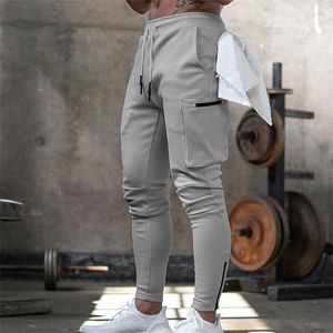 Pantalons Hommes Jogger pantalons de survêtement homme gymnases entraînement Fitness coton pantalon mâle décontracté mode maigre pantalon de survêtement fermeture éclair conception pantalon