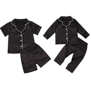 Pyjamas småbarn baby svart satin spädbarn pojke kortlång ärm byxor sömnkläder casual knapp twopieces set hemkläder 231127