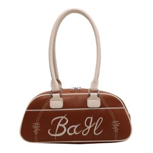 Borsa tote grande portatile per donna 2024 Nuova moda alla moda Borse monospalla sotto ascella Autunno Borsa da viaggio occidentale Borse a cuscino Portafoglio