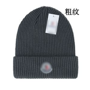 Novo designer de inverno boné de malha de lã chapéu de lã das mulheres dos homens grosso quente pele do falso pom chapéus feminino bonnet k-10