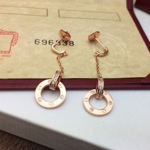 女性スタッドデザイナーのゴールドメッキ18kt0p高品質の高級クリスタルジュエリー最高のカウンター高度な材料ボックス005のラブイヤリングチャーム