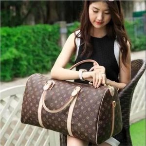 PU Leder -Duffle Bag Duffel Bags 55 cm Gepäck fahren Handtaschen Frauen große Kapazität Gepäck Gepäck wasserdichte Handtasche Ca221a