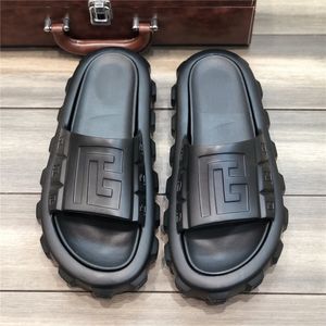 2023 Slifori da uomo di moda Ari piatti eva muli diaposili bianchi sandali in spiaggia neri piatti scarpe da donna flip flops piattaforma slipper designer slide 37-45