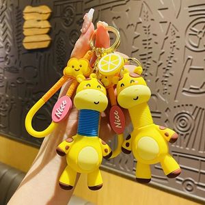 Chaveiros criativo retrátil primavera brinquedo girafa boneca chaveiro agradável nuvem limão pingente de pescoço longo veado animal chaveiro menina saco trinket