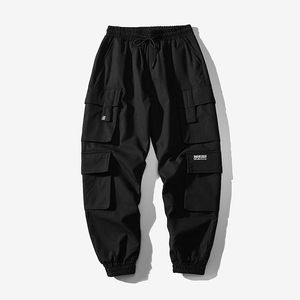 Byxor nya män jogger byxor streetwear 2021 herr last byxor overalls fickor hip hop joggar sweatpants manliga svarta mode 5xl