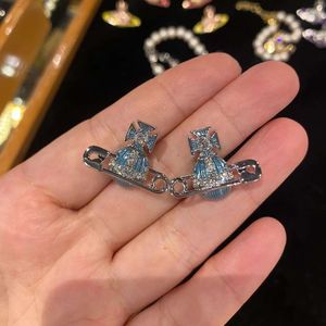 Designer vivienen Westwoods Neue Viviane Empress Dowager Saturn Pins Emaille-Ohrringe für Frauen, leichte, luxuriöse, süße blaue, orangefarbene Planeten-Ohrringe, High Edition