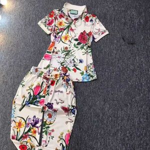Kvinnors spårdräkter Designer Kvinnor Summer T Shirts Long Pants Suits With Flowers Pattern Fashion Tracksuit Two Pieces Set Design Clothing AN35