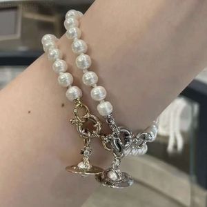 Designer Viviene Westwoods Nouveau Viviennewestwood New Western Empress Dowager Baroque Saturn Pearl Bracelet Luxe léger et élégance extraordinaire trois dimensions