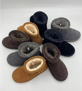 مصمم الثلج أحذية الشتاء الحذاء الأسترالي الحقيقي للأطفال بوي فتاة طفل دافئ الطالب شتاء الكاحل الحذاء EUR25-34 G0598