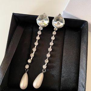 Kolczyki stadnorskie europejskie i amerykańskie kropelki wody mody lekkie luksusowe perły bez przebitych klipsów do uszu